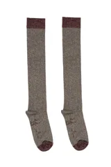 Calcetines de caña alta con acabado brillante de glitter, confeccionados en una mezcla de algodón y fibras metalizadas.