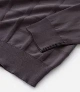 Suéter de punto color azul marino con textura cuadrillé, cuello redondo y terminaciones acanaladas en puños y ruedo.