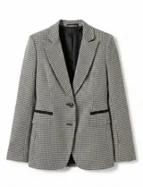 Blazer de corte sastre con estampado de cuadros gales, cuello con solapas clásicas, cierre frontal con botones y bolsillos delanteros. Cuenta con forro interior a tono.