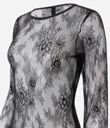 Vestido midi de encaje negro con diseño de transparencia, corte recto, cuello redondo y mangas largas.