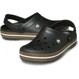 Zuecos Crocs modelo Crocband Clog Gum, color negro con banda lateral en tono caramelo y línea blanca. Diseño con orificios de ventilación, tira trasera pivotante y suela cómoda de espuma Croslite.