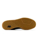 Championes de skate New Balance 440, color negro con suela marrón.