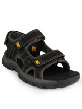 Sandalias Caterpillar modelo Giles para hombre, color negro con detalles en amarillo y gris. Capellada de PU nubuck y canvas, con tiras ajustables con velcro, forro de nylon mesh y suela de goma.