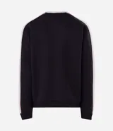 Buzo de corte boxy con diseño color block en negro, blanco y detalles en bordó. Presenta cuello redondo, mangas largas con puños acanalados y estampado lettering frontal con la frase Elevate Clothing & Culture.