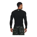 Remera deportiva blanca de manga larga Under Armour HeatGear®, con paneles de malla en axilas y espalda para ventilación, costuras ergonómicas y construcción híbrida de manga raglán para mayor rango de movimiento.