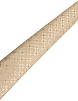 Corbata de seda azul marino con estampado paisley en tonos rosados y blancos.