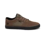 Championes Etnies modelo Barge LS de color negro, con diseño de perfil bajo, suela blanca y detalles en lona y gamuza.