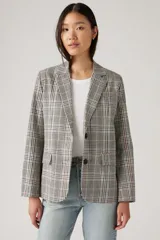 Blazer a cuadros color gris, con solapas de muesca, cierre frontal con un botón y bolsillos delanteros con solapa.