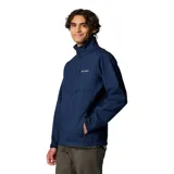 Campera softshell Columbia modelo Ascender Soft Shell, color azul marino, con cuello alto, cierre frontal completo y bolsillos laterales y en el pecho con cierre.