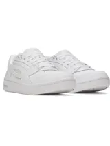 Championes Under Armour modelo UA Flex, color blanco, con parte superior de cuero y suela resistente.