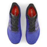 Championes de running New Balance FuelCell Rebel v3, color azul con detalles en negro y blanco.