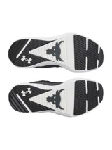 Championes de entrenamiento Under Armour Project Rock BSR 5, color negro con suela blanca. Presentan una parte superior de malla transpirable con refuerzos sintéticos, mediasuela Charged Cushioning para amortiguación reactiva y tecnología UA TriBase para mayor estabilidad y contacto con el suelo.