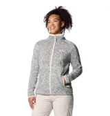 Campera polar Columbia modelo Sweater Weather Full, de color gris melange con detalles y cierre en color blanco. Cuenta con cuello alto, bolsillos laterales con cierre y logo de la marca bordado en el pecho.