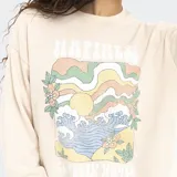 Buzo de algodón con cuello redondo y diseño holgado, con efecto lavado y estampa frontal colorida con motivos de playa y olas.