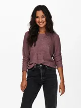 Sweater de punto con cuello redondo y manga larga, de corte regular y textura suave.