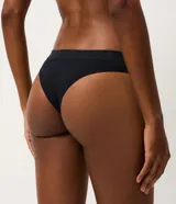 Bombacha de bikini Lov de corte clásico y diseño texturizado, color negro, confeccionada en poliamida sin costuras.