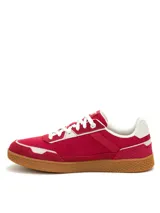 Sneakers Caterpillar modelo Pause Retro Canvas, de color rojo con detalles en blanco y suela de goma marrón.