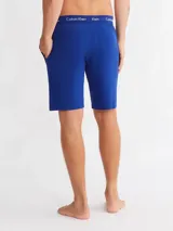 Shorts de pijama azules de algodón con cintura elástica.
