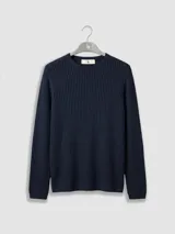 Sweater de tejido calado azul marino con cuello redondo y mangas largas, confeccionado en algodón.