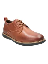 Zapato casual de cuero color marrón con cordones, costuras reforzadas y suela de EVA negra con detalle de vira clara.