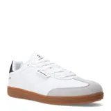 Championes urbanos Topper modelo Rocket, de color blanco con puntera de gamuza gris y suela de goma color caramelo. Presentan cierre por cordones, detalle de logo en la lengüeta y lateral, y un refuerzo negro en el talón.