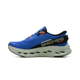 Championes deportivos Skechers Slip-Ins Max Cushioning Glide Step modelo Advert, color azul con suela geométrica gris, detalles en negro y naranja, y el logo de la marca en el lateral.