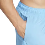 Short de baño celeste Adidas, con cintura elástica y cordón de ajuste. Incluye calzoncillo interno de malla y bolsillos laterales.