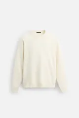 Jersey de punto de tacto suave con diseño de rayas horizontales anchas en color rosa claro y marrón oscuro. Presenta cuello redondo, manga larga y terminaciones en rib.