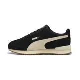 Championes urbanos Puma modelo R78 Wind SD, color negro con detalles en beige. Presentan un diseño de inspiración retro con la icónica franja lateral de la marca en contraste, suela de goma y entresuela amortiguada.