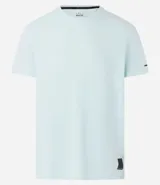 Remera deportiva de hombre con tecnología dry fit, cuello redondo y manga corta. Presenta un diseño liso en color beige con una pequeña etiqueta decorativa en el dobladillo.
