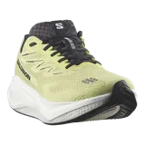 Championes de running Salomon modelo Aero Blaze 4, color amarillo claro con suela blanca y detalles negros.