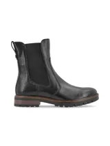 Botín de cuero negro con elásticos laterales al tono, caña media y suela de goma con detalle de vira marrón.