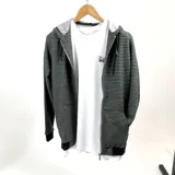 Campera con cierre y capucha, a rayas horizontales en tonos verde inglés y gris.