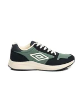 Championes urbanos Umbro modelo Volcan II, con paneles de tela verde y refuerzos de gamuza sintética azul marino. Presenta el logo de la marca en el lateral, cordones blancos y suela de goma en tono crema.