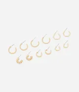 Set de seis pares de aros dorados con diferentes diseños: aros con bolitas, aros trenzados, aros lisos y aros hexagonales.