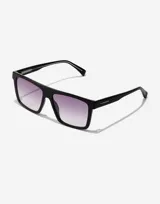 Lentes de sol Hawkers unisex, modelo Aspen, con montura cuadrada negra y lentes degradadas de negro a violeta.