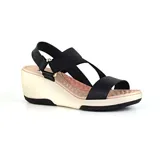 Sandalias con plataforma Korium Confort de tiras cruzadas negras y plataforma blanca.