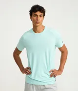 Remera deportiva de hombre Get Over color verde menta, con tecnología dry fit, cuello redondo y mangas cortas.