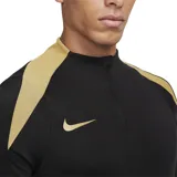 Camiseta de entrenamiento Nike Strike negra con detalles dorados en cuello y hombros, cierre parcial con cremallera y logo de la marca bordado en el pecho.