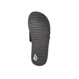 Ojotas Volcom modelo Recliner Slide, color negro, diseñadas en colaboración con el surfista Jack Robinson. Cuentan con una tira ancha superior y plantilla con almohadillas moldeadas para mayor comodidad.