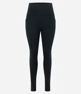 Calza deportiva tipo legging de tiro alto, color negro, confeccionada en microfibra térmica con bolsillo lateral funcional. Diseño liso y ajustado al cuerpo.