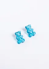 Par de caravanas con forma de osito de goma color celeste, hechas de acrílico y acero.