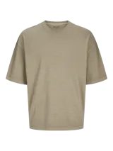 Camiseta color arena de algodón con cuello redondo y corte oversize.