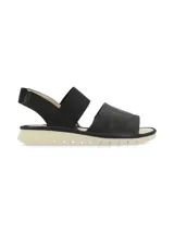 Sandalia Pasqualini modelo Malawi de color negro, con tiras anchas elásticas en el empeine y el talón, plantilla de cuero y suela dentada en tono beige.