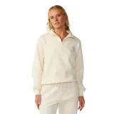 Buzo Rip Curl de felpa color blanco, con cuello alto y cierre corto de medio zip. Cuenta con manga larga y un pequeño estampado circular en lila en el pecho.