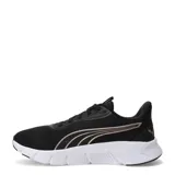 Championes deportivos Puma modelo Flex Focus Lite Modern, color negro con detalles en tono cobre. Presentan una suela blanca de alta amortiguación y el logo de la marca en el lateral y la lengüeta.