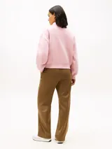 Buzo de cuello redondo Tommy Hilfiger color rosado, confeccionado en mezcla de algodón y poliéster reciclado, con mangas largas y logo bordado en el pecho.