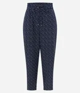 Pantalón femenino de crepé color azul marino con estampado geométrico blanco. Presenta cintura alta elástica con lazo delantero y corte holgado.