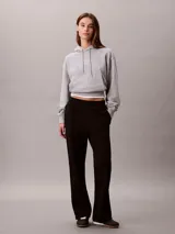 Pantalón deportivo de felpa francesa Calvin Klein, color negro, de corte recto con cintura elástica.