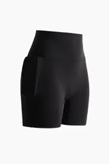 Bikers deportivas negras de tiro alto, confeccionadas en tejido funcional suave con cintura ancha de sujeción.